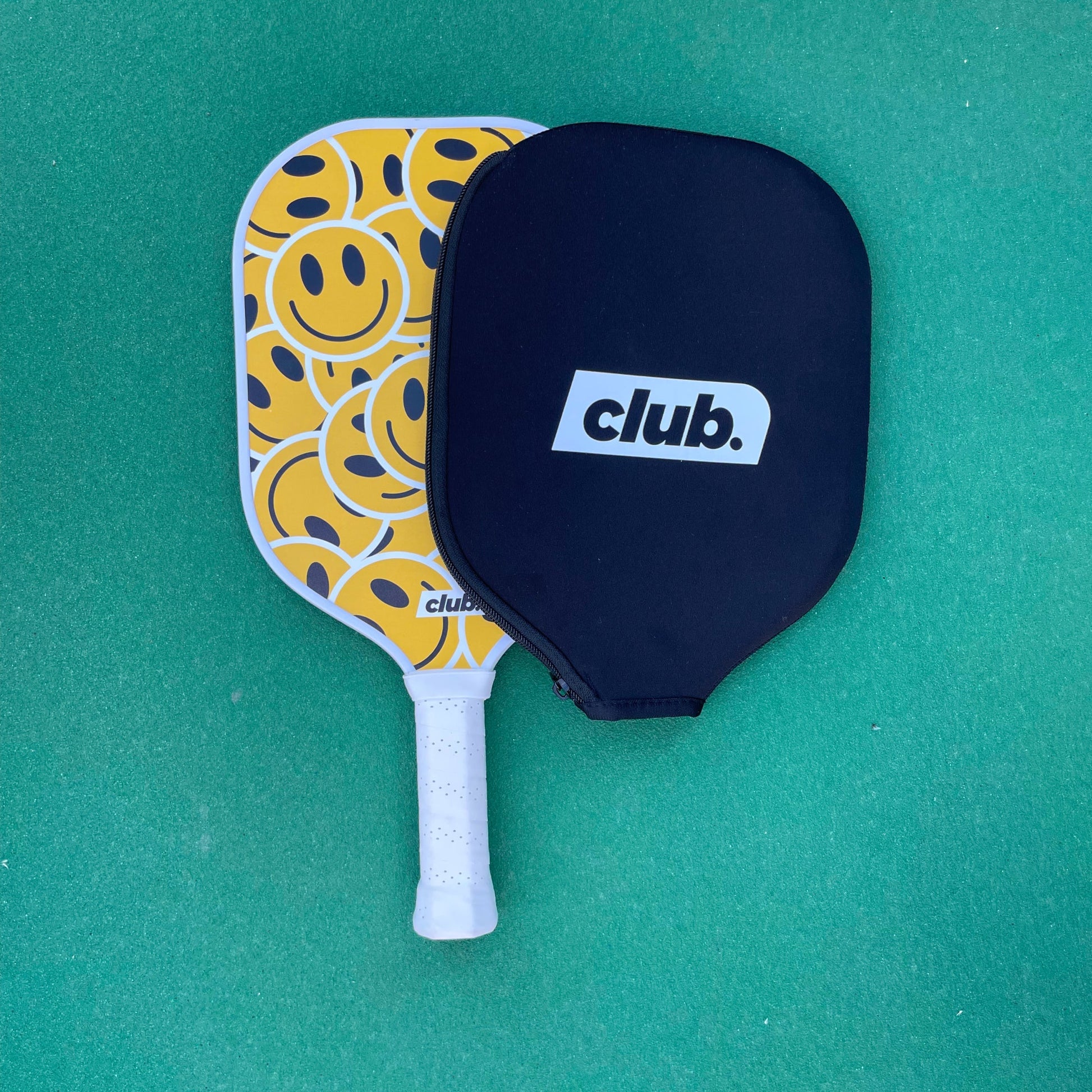 pickleball paddle with smiley faces on it #style_smiley