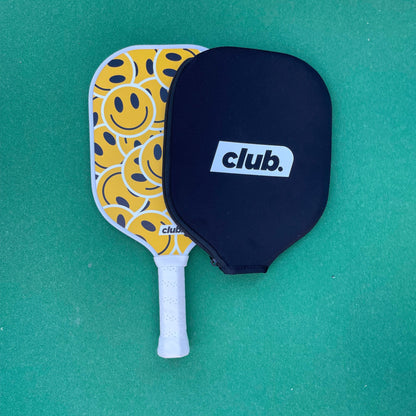 pickleball paddle with smiley faces on it 